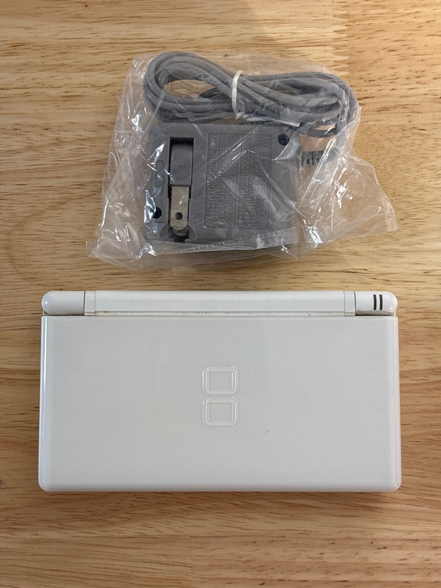 White Nintendo DS Lite with Charger, Stylus and GBA Dust Cover - ChronicCards