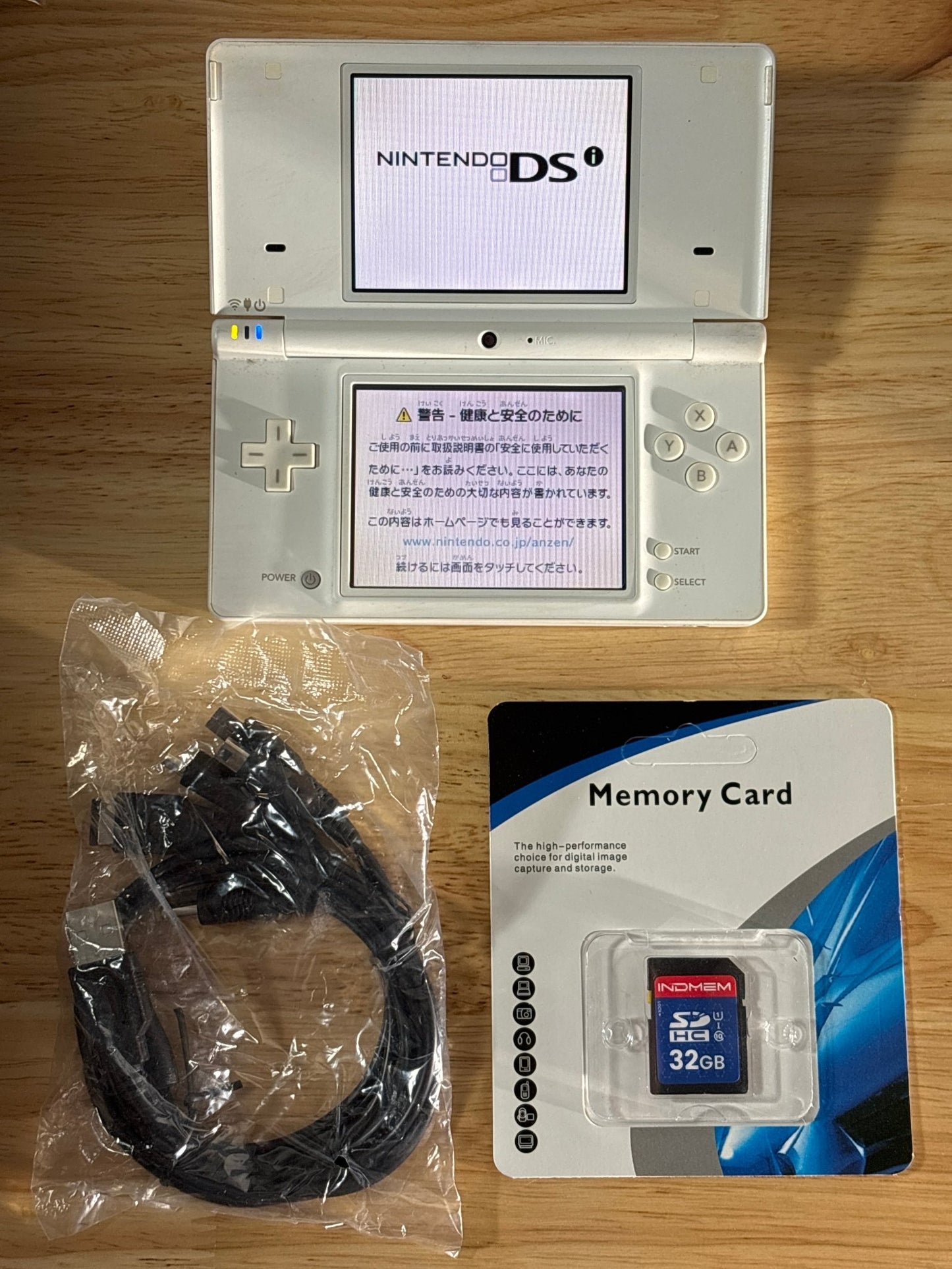 White Nintendo DSi w/ Charger & 32GB Memory Card - ChronicCards